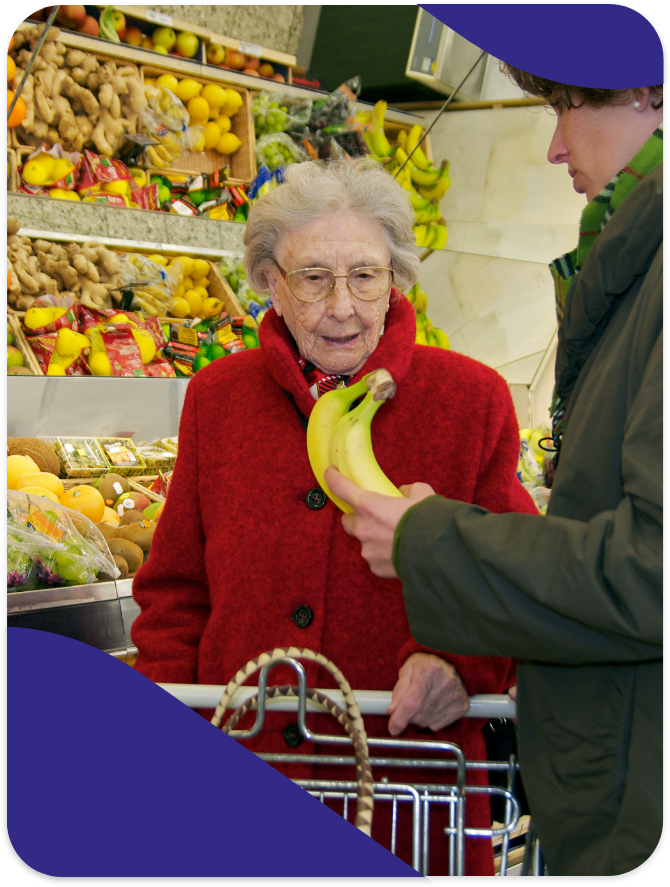 Live-in Carer Shopping With Elderly Client In Hampshire