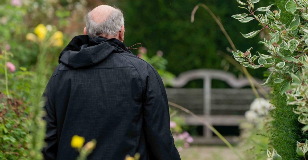 Elderly man in a garden
